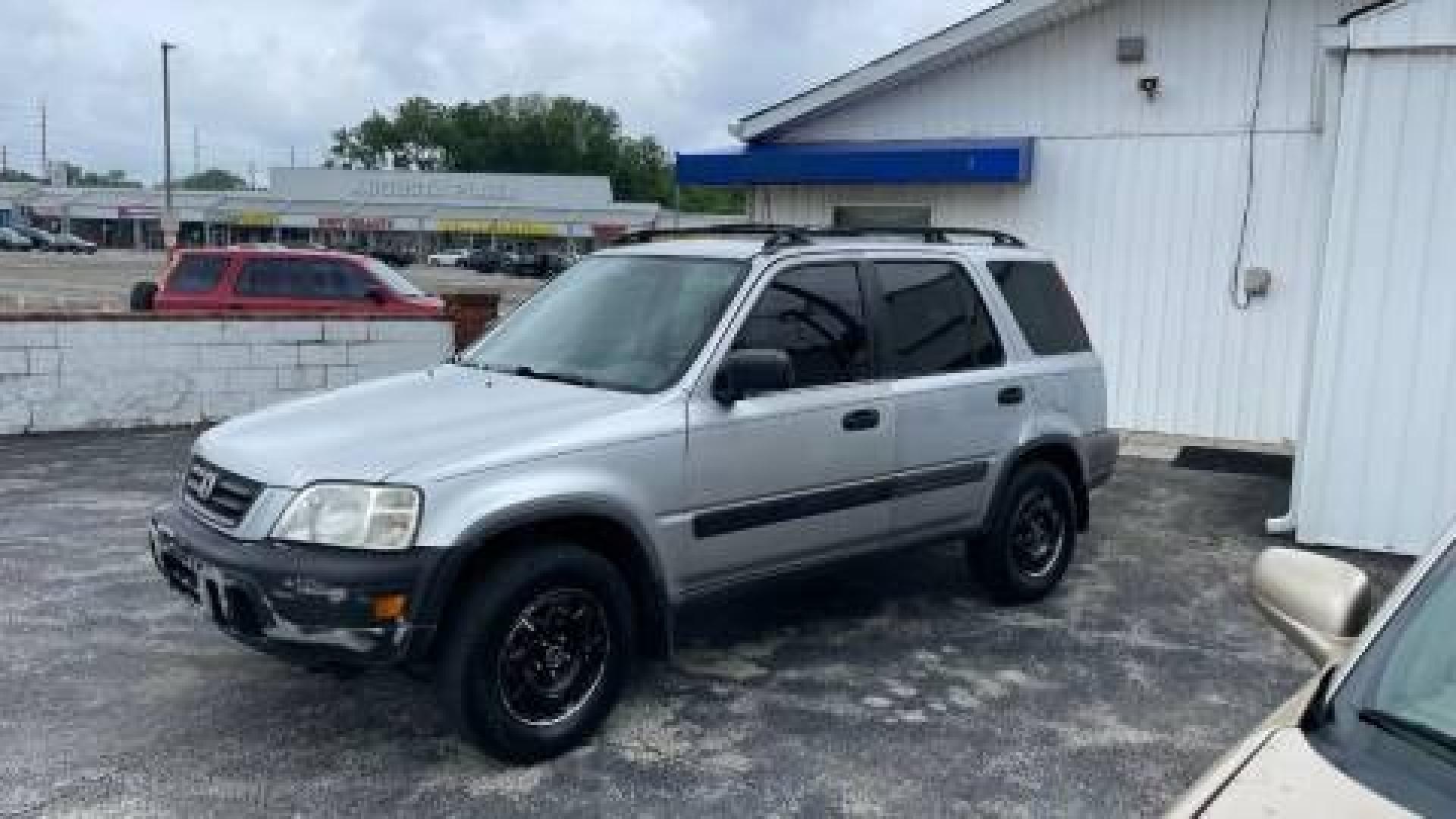 2001 Silver Honda CR-V LX 2WD (JHLRD28411S) with an 2.0L L4 DOHC 16V engine, 4-Speed Automatic Overdrive transmission, located at 2710A Westlane Rd., Indianapolis, IN, 46268, (317) 291-2000, 39.885670, -86.208160 - Photo#0